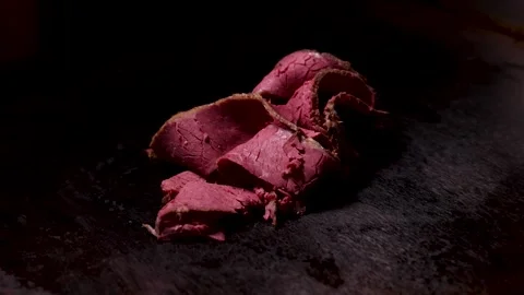 CloseUp Cooking Sequence of Sizzling Pastrami on a Hot Griddle, grilling meat to Stock Footage 277642276