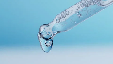 Closeup cosmetic fluid gel with bubbles from dropper, pipette Stock Footage 259304531