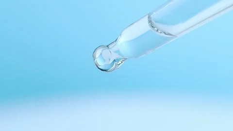 Closeup cosmetic liquid with bubbles from dropper, pipette Stock Footage 259304053