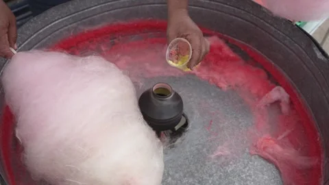 Closeup of of the cotton sugar candy making, slow moiton Stock Footage 330100101