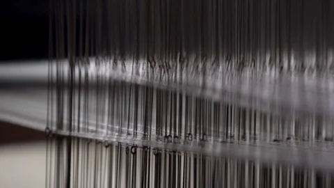 Closeup Of Cotton Thread Being Weaved In A Textile Factory. Stock Footage 120060041