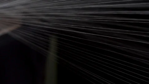 Closeup Of Cotton Thread Moving Through A Warping Machine. Stock Footage 119805875