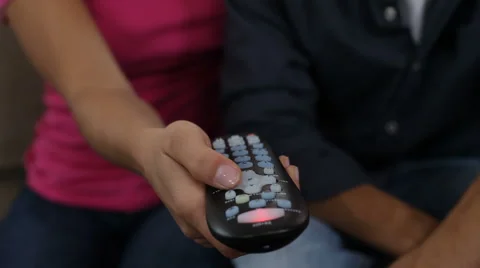 Closeup of couple with television remote Stock-Footage 62347508
