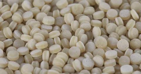 Closeup of Couscous lying on the table 스톡 동영상 128649403