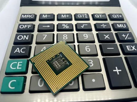 Closeup of CPU microprocessor chip with golden contacts on calculator 写真素材
