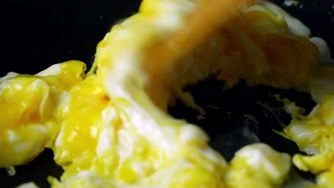 Closeup of Cracked Egg Sizzling on a Frying Pan Stock Footage 194514529