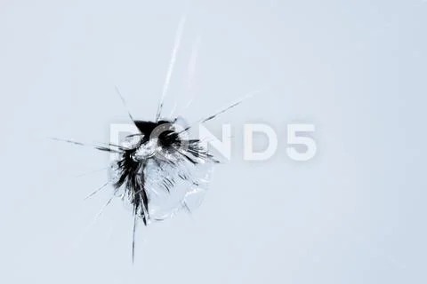 Closeup of cracked windshield with fissure lines, abstract background with co Stock Photos