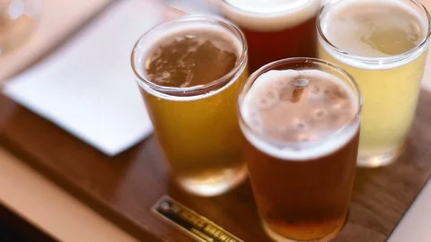 Closeup of a craft beer taste flight Vidéo 79579182
