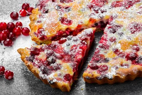 Closeup Cranberry pie on gray background Stock Photos
