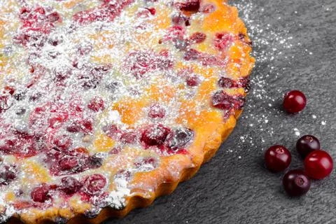 Closeup Cranberry pie on gray background Stock Photos