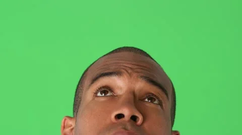 Closeup of cropped man's face looking up and thinking Vídeos de archivo 11858844