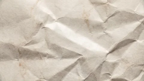 Closeup of crumpled beige paper texture background, animated background Video stock 333977476