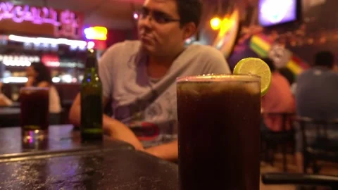 Closeup of a cuba libre on a bar table in 4k Stock-Footage 196736783