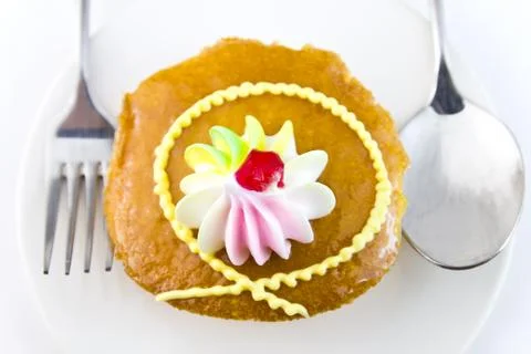 Closeup cup cake and fork Stock Photos