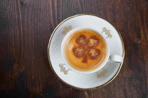Closeup of cup of coffee with pattern and nice design Stock Photos