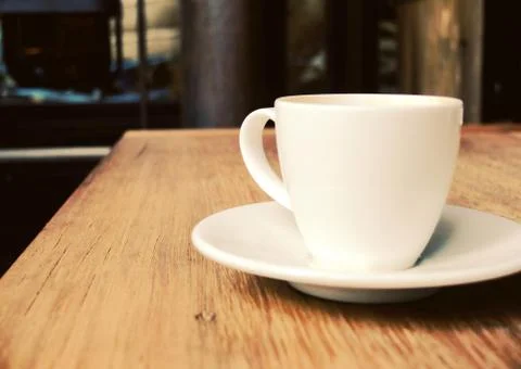 Closeup of cup of coffee on table at coffee shop Stock-Fotos