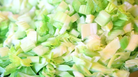 Closeup of cut green celery roots with cabbage Stock Footage 40617653