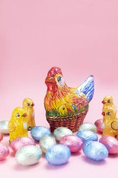 Closeup cute Paschal, Easter kids gift. Chocolate hen, little chickens with Stock Photos