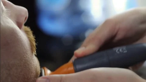 Closeup cutting and grooming beard old-styled footage Video stock 77949979