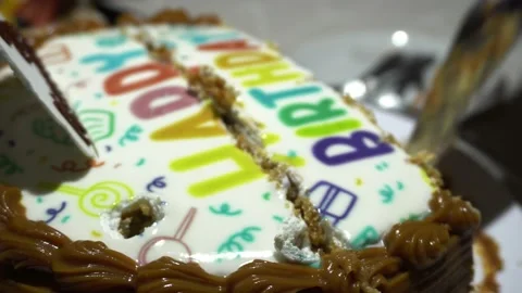 Closeup cutting and serving a happy birthday cake with delicacy and sponge cake 스톡 동영상 167372865