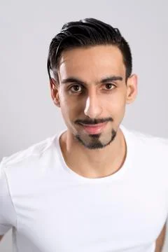 Closeup of Dark-Haired Bearded Young Man in White Shirt Stock Photos