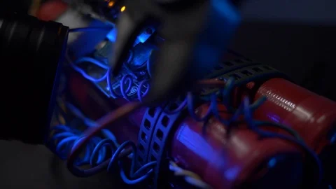 Closeup Deactivating a Bomb With Some Pliers Stock Footage 90710264