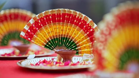 Closeup of decorative multi colour Thiru Udayada arranged on pooja plate fo.. Stockbeeldmateriaal 332916028