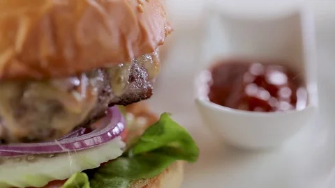 Closeup of a Delicious Burger Stock Footage 90942903