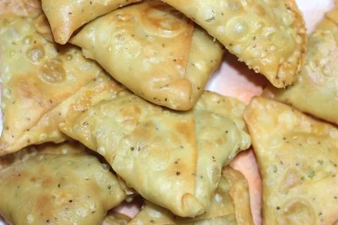 Closeup of delicious home made samosa or pastries food on white background Stock Photos