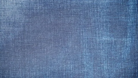 Closeup detail of blue denim jeans texture background 4K Stock Footage
