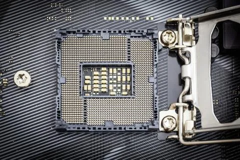 Closeup detail of CPU socket of a modern computer black motherboard. Stock Photos