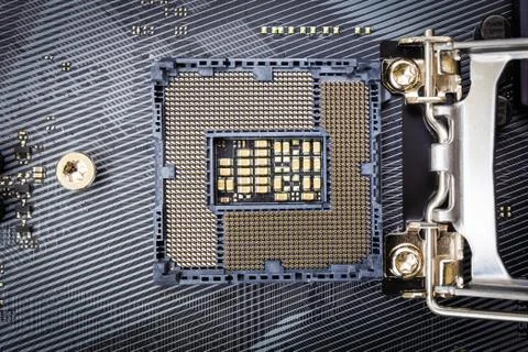 Closeup detail of CPU socket of a modern computer black motherboard. Stock Photos