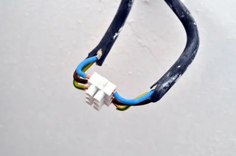 Closeup detail of electrical cable from the socket boxes Stock Photos