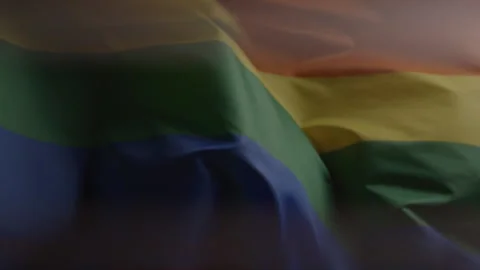 Closeup Details of Rainbow Pride Flag Blowing in the Wind Stock Footage 270315053