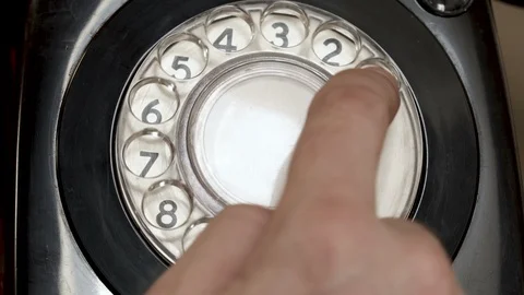 Closeup on dialing Using A vintage  Rotary Phone Stock Footage 88398203