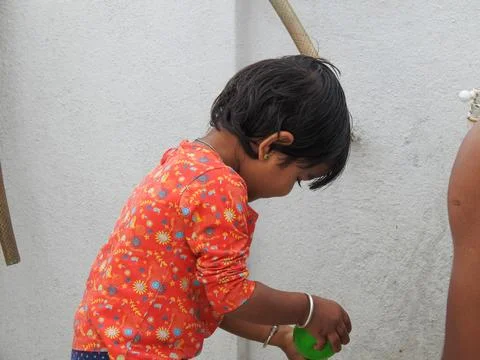 Closeup of different activity and actions of Indian girl kid playing above .. Stock Photos