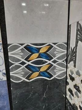 Closeup of different types of building tiles and sanitary display in the stor Fotos de archivo