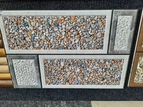 Closeup of different types of building tiles and sanitary display in the stor Foto stock