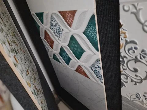 Closeup of different types of building tiles and sanitary display in the stor Stock Photos