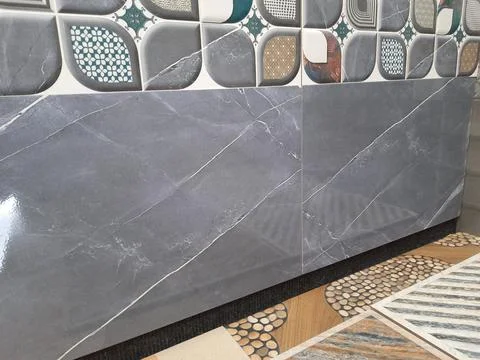 Closeup of different types of building tiles and sanitary display in the stor Fotos de archivo