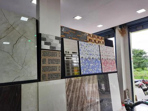 Closeup of different types of building tiles and sanitary display in the stor Fotos de archivo