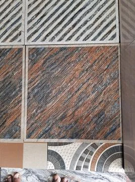 Closeup of different types of building tiles and sanitary display in the stor Fotos de archivo