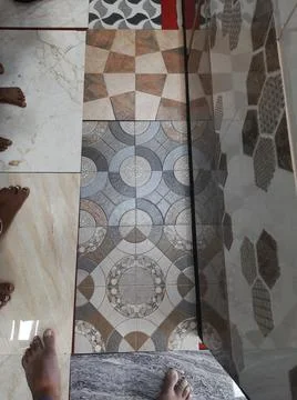 Closeup of different types of building tiles and sanitary display in the stor Fotos de archivo