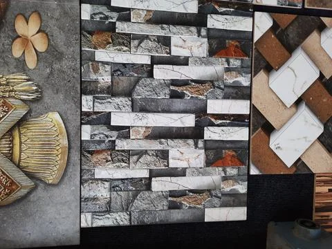Closeup of different types of building tiles and sanitary display in the stor Fotos de archivo