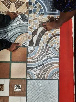 Closeup of different types of building tiles and sanitary display in the stor Stock Photos