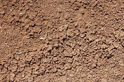 Closeup dirt pattern with cracks and holes Stock Photos