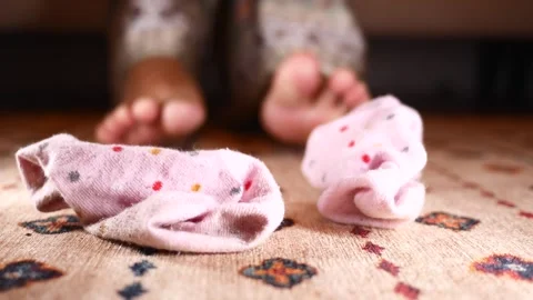 Closeup of dirty socks on a carpet Stock-Footage 305895305
