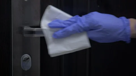 Closeup of Disinfection Of The Door Lock Video stock 128368317