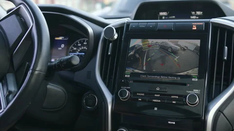 Closeup of display with image reverse parking. Maneuvering between two cars Stock Footage 261740199