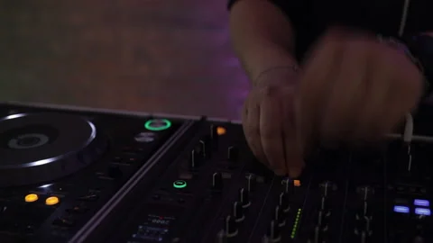 Closeup of dj hands with light effects. Front view Stock Footage 157307964
